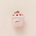Detailed macro view of 18K gold plated jam jar charm with mushroom lid and gold metal ring - Strawberry Jam / Pink