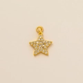 Macro shot of gold star pendant with micro-pave white zircon crystals and dual metal loops - Rhinestone Pentagram Pendant Only (Without Chain)
