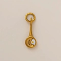Detailed view of gold plated stainless steel frying pan pendant with fried egg enamel detail - Fried Egg Pendant