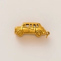 Detailed close-up of a vintage golden car pendant with matte 18K gold plated finish - Car