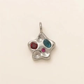 Detailed view of silver polished star pendant with red, blue and pink zircon gemstones - No.8 Star