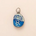 Detail of oval enamel pendant featuring cat design and 18K gold plated metal loop - Blue Fish Head Round Pendant