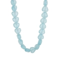 Macro detail of light blue heart-shaped beads with frosted texture and subtle shimmer - Necklace / Blue