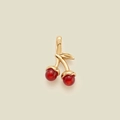 Detailed view of cherry zircon pendant with red beads and textured gold leaves - Cherry Pendant