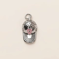 Detail shot of silver baseball cap pendant with a pink heart on a plain background - Hat