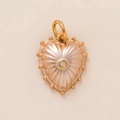Detailed close-up of a heart pendant with pink pearlescent inlay and a central clear gemstone - Pink Heart