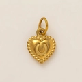 Détail d'un pendentif cœur en or 18 carats avec motif fer à cheval et bord perlé - Pendentif cœur / Or