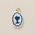Detail of oval ceramic pendant featuring a blue martini glass and gold jump ring - Round Edge Wine Glass
