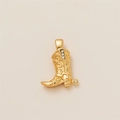 Detail of gold cowboy boot pendant featuring scroll engravings and white crystals - Boots Charm