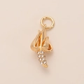Vue détaillée du pendentif doré en spirale avec strass pour création de bijoux - Pendentif Banane Spirale