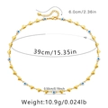 Vista detallada del collar de ojo turco con eslabones de corazón dorado y medidas - Estilo Ojo Azul Corazón Oro (KN0145)