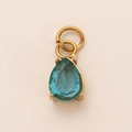 Detail of pear-cut light blue stone pendant in 18K gold-plated stainless steel base - Blue Teardrop Zirconia Pendant