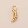 Detailed close-up of a 14K gold plated croissant pendant with fine textured details - Gold Croissant Pendant