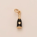 Macro detail of a gold-plated wine bottle pendant with black enamel and a 3D heart icon - Black Enamel Heart Wine Bottle Pendant
