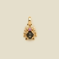 Gold-plated spider pendant featuring a black star sapphire and a pink gemstone accent - Black Spider Pendant