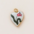 Detail of 18K gold-plated heart pendant with white enamel and pink tulip floral design - Pink Tulip Heart Style