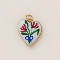 Detailed close-up of a heart pendant with 18K gold plating and enamel floral pattern - Red Floral Bow Heart Style