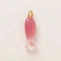 Pink resin fish pendant with 18K gold plated loop on light grey background - Pink Fish Pendant