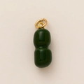 Close-up of a green gourd pendant with polished enamel finish and gold metal rings - Green Beaded Pendant