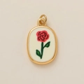 Detail of 18k gold plated oval pendant featuring a delicate red rose with green stem - June Flower Pendant / 1 Piece