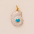 Detail of seashell charm with gold metallic border and blue gemstone inlay - Conch Pendant / Dark Blue Conch