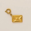 Close-up of a gold-plated envelope charm with a heart motif and a spring ring clasp - Love Letter Pendant