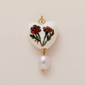 Detail of heart-shaped ceramic pendant with hand-painted flowers and a hanging pearl - Heart Carnation Pearl Pendant