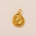 Macro detail of a 14K gold plated owl coin pendant with vintage textured finish - Owl Pendant