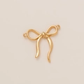 Detailed close-up of a 18K gold-plated bow-shaped metal pendant with dual connector rings - Bow Pendant Style A