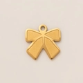 Detailed macro shot of 18K gold plated stainless steel bow pendant with matte finish - Bow Pendant Style C