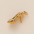 Close-up of polished 18K gold plated high heel pendant charm with metallic luster - High Heel