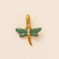 Macro shot of dragonfly pendant with green enamel wings and clear cubic zirconia in 18K gold - Dragonfly Pendant