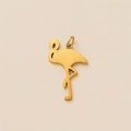 Detailed macro view of gold flamingo pendant with brushed texture finish and ring clasp - Flamingo Pendant