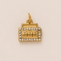 Macro view of a vintage gold alloy slot machine pendant with 777 engraving and crystals - Slot Machine Shaped Pendant / Pendant Only (Without Chain)