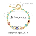 Detail view of Evil Eye beaded bracelet showing dimensions: 16.5cm length and 3.4g weight - Green Faceted Bead Eyeball Pendant (KB0353)