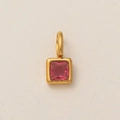 Detailed shot of a 18K gold plated square pendant with deep pink birthstone - July Birthstone Pendant / Gold