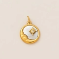 Detail of a 18K gold circular pendant with white mother of pearl and moon face relief - Gold Sun Moon Star Shell Pendant