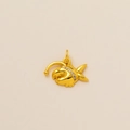 Detailed view of a golden anglerfish pendant with white zircon inlay on beige background - Anglerfish