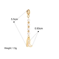 Close-up of golden pearl earring with a white boot pendant and measurement specs - Boot Pearl