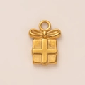 Makroaufnahme der 18K vergoldeten Geschenkschachtel mit mattem Finish und Schleife - Geschenkbox