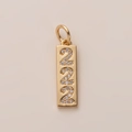 Macro shot of 18K gold plated rectangular pendant with crystal encrusted number 222 - Number 2 Pendant