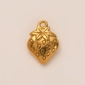 Detailed view of a golden strawberry pendant with textured seeds and embossed leaf detail - Strawberry Pendant