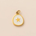 Detail of 18K gold-plated oval pendant with white enamel and golden star charm - Fried Egg Star