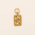 Close-up of vintage 18K gold plated celestial pendant with moon and star details - Rectangle Star Moon Pendant