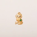Detail of 18K gold-plated owl pendant with green enamel wings and white eyes on branch - Owl Pendant