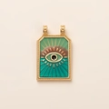 Detailed macro view of 14K gold plated rectangular tarot pendant with evil eye enamel - Blue Green Evil Eye