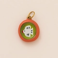 Detail of round bird pendant with green matte background and golden metal ring - Round Pendant / Green Background White Bird