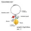 Bague citron en résine jaune avec perle et feuille de zircon sur anneau en acier - Bague Pendentif Citron Couleur Acier - Taille 7