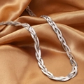 Braided triple-strand silver flat snake chain necklace on golden satin background - Necklace / Steel