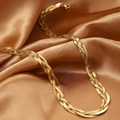 Three-layer braided gold snake chain necklace with lobster clasp on silk fabric - Necklace / Gold